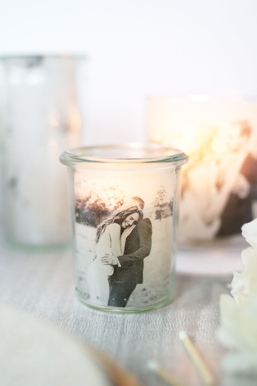 These DIY candle holders incorporate photos of you and your love and are sure to give your guests something to talk about at your wedding reception.